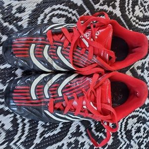 Black and Red Adidas Cleats